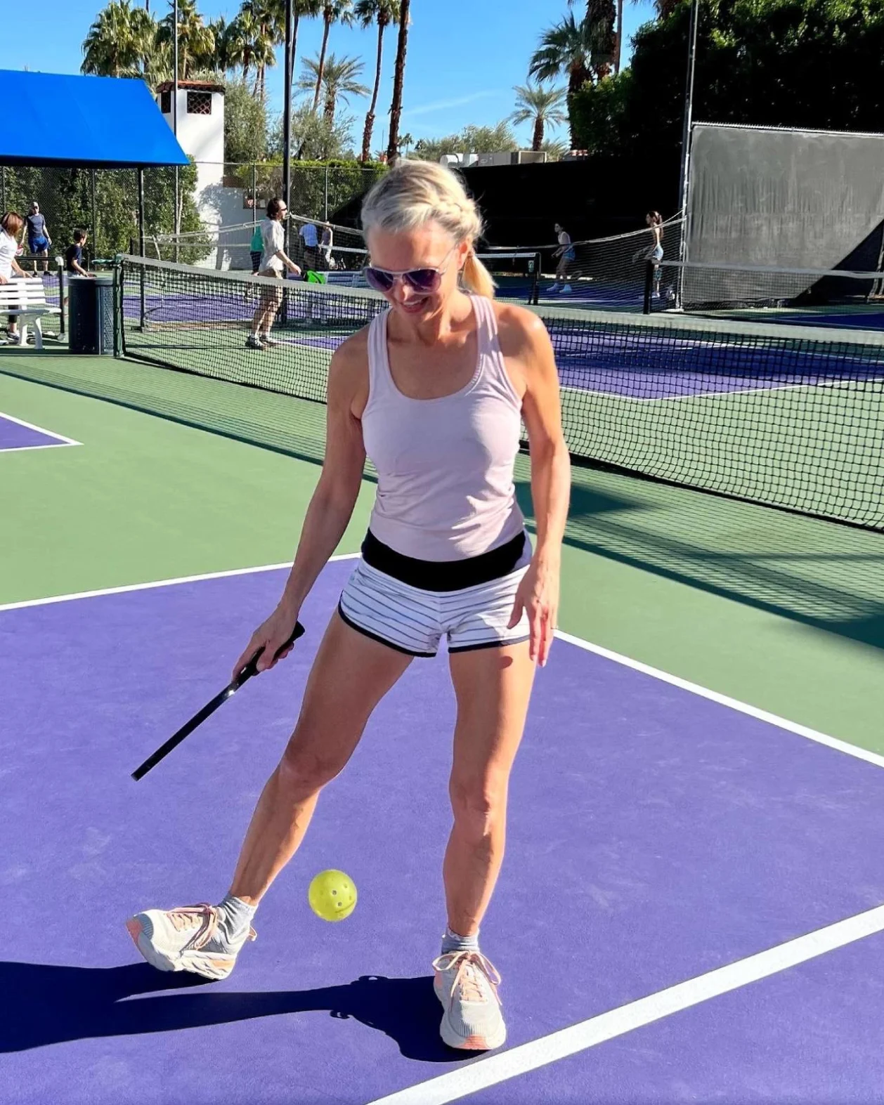 woman on pickleball court
